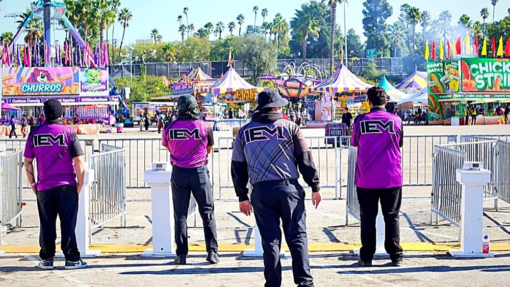 IEM team at fairground gates
